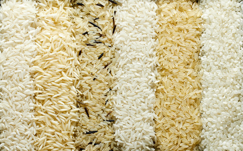 Comparison of Indian rice types including basmati, Sona Masoori, Ponni, Kerala Matta and idli rice displayed side by side.