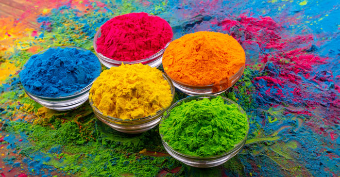 Traditional bowls of vibrant Holi colours symbolising joy, renewal and spring